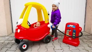 Little Girl Elis and Baby Doll Ride On Power Wheel and Little Tikes Cozy Coupe ran out of Petrol