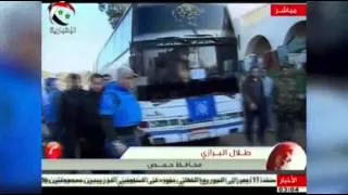 Raw: Dozens Evacuated From Syrian City of Homs