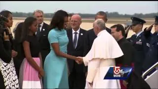 President Obama greets Pope as he arrives in America