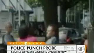 Cop Punches Woman on Tape