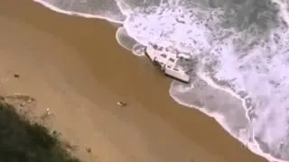 Policeman saves sailing couple