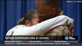 Navy sailor surprises brothers at high school wrestling tournament