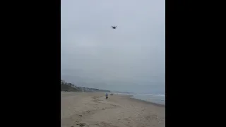 My DBUS2 drone is tracking me and my dog during a beach walk