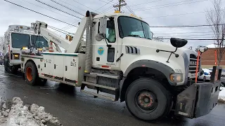 NYC Dept Of Sanitation Wrecker Towing A Collection Truck On East 233rd Street In Baychester, Bronx