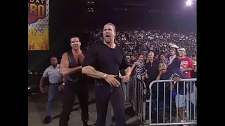 The Outsiders jump the guard rail and come for Bischoff. WCW Locker room empties to confront them!