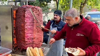 Market chef preparing outdoor addictive doner kebab for the long queue!