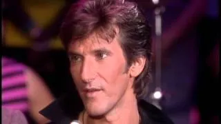 Dick Clark interviews John Cafferty and the Beaver Brown Band- American Bandstand 1984