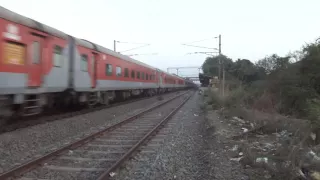 Indian Railways..HOG WAP7 with Steam loco-like honking at MPS with August Kranti Rajdhani express