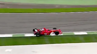 Fernando Alonso fights Micheal Schumacher at San Marino 2005