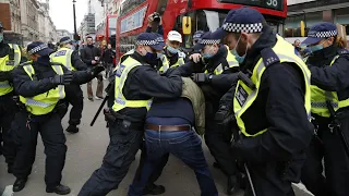 Aerial footage of scuffles between anti-lockdown protesters and police in London