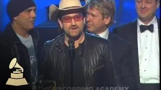 U2 accepting the GRAMMY for Album of the Year at the 48th GRAMMYs | GRAMMYs