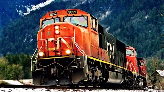 Canadian National EMD In The Lead Thru Curve With Eerie Sounding Horn!