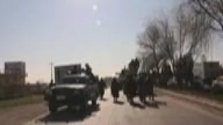 Taliban fighters hold military parade in Herat