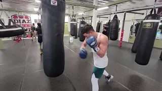 Dmitry Bivol hitting heavy bag