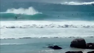 Noordhoek catching waves