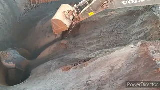 Hopper cleaned by long volvo excavator ll hopper fast cleaning for uninterrupted iron ore production