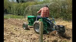 Mounting a tiller to the 3 point hitch of the homemade 3-16 tractor.