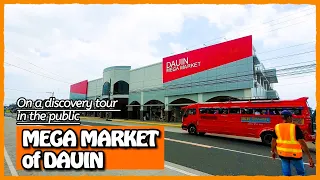 On a discovery tour in the new public MEGA MARKET of DAUIN