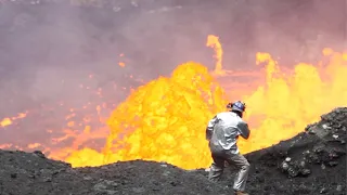 Throwing A Huge Rock Into A Volcano And It EXPLODES