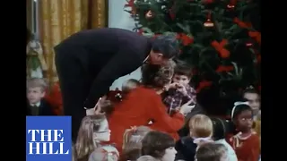 President Reagan and First Lady Nancy Reagan light White House Christmas Tree in 1981