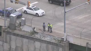 Truck crashes onto I-75