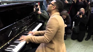 John Legend surprises commuters at St Pancras with piano medley