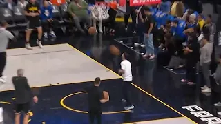 Stephen Curry pregame full court tunnel shot hits ball boy straight in the head 😬