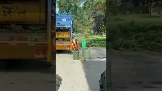 Garbageman Working Hard