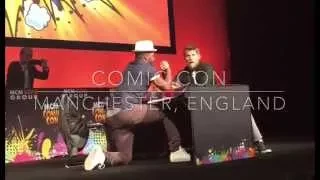 Jocko Sims and Travis Van Winkle arm wrestle in Manchester, England for MCM Comic con