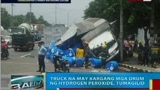 Truck na may kargang mga drum ng hydrogen peroxide, tumagilid sa Sampaloc, Maynila