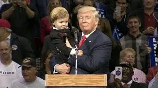 Trump picks up a pint-sized supporter at rally