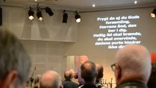 Singing some church hymn at a church in Vajle, Denmark