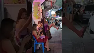 funny Massasge Girl performing on the street in Patong, Thailand 2023