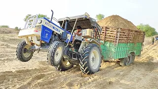 Swaraj 744 FE tractor got stuck in a trolley loaded with full weight | JCB machine pushed tractor