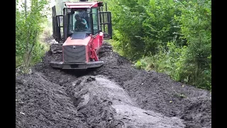 Valmet 840.3 logging in wet forest, difficult conditions