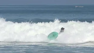 at kuta beach with ordinary surfers