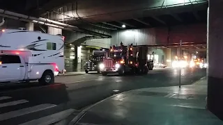 Convoy of Logging Trucks in Vancouver