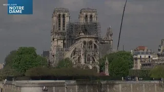 French president promises rebuild of Notre Dame Cathedral