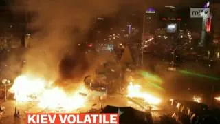 mitv - Police storm main protest camp in Ukraine's capital, Kiev