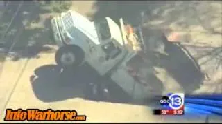 Dump truck falls into giant sink hole