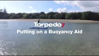 How to SUP - Putting on a Buoyancy Aid