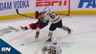 Brad Marchand Knocks Down Matthew Tkachuk With Massive Hit