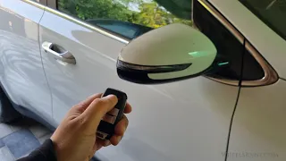 How to enable or disable auto folding mirrors in Kia Sportage
