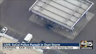 SUSPECT ARRESTED: LA police chase Dust storm - Hotel trasher, STOPS FOR GAS