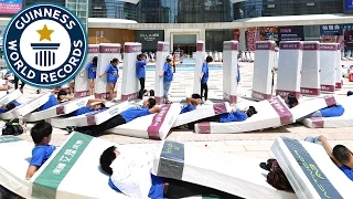 Incredible Human Mattress Dominoes - Guinness World Records