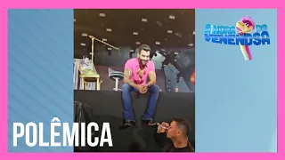 Gusttavo Lima oferece bebida para segurança durante show