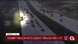 Dump truck hits ODOT truck on I-77