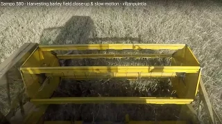 Sampo 580 - Harvesting barley field close-up & slow motion