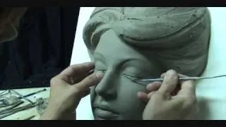 Sculpting a face in clay. Sculpting demo how to sculpt girl's face.