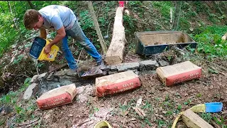 Building Creek Rock and Concrete Footers - Timber Bridge in the Woods